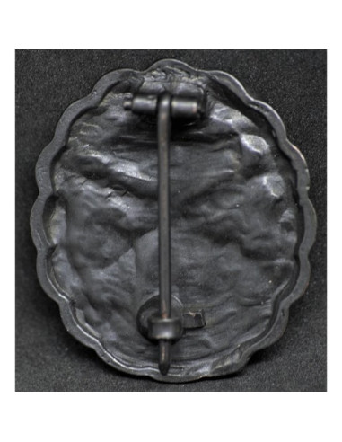 noir badge Marine blessé